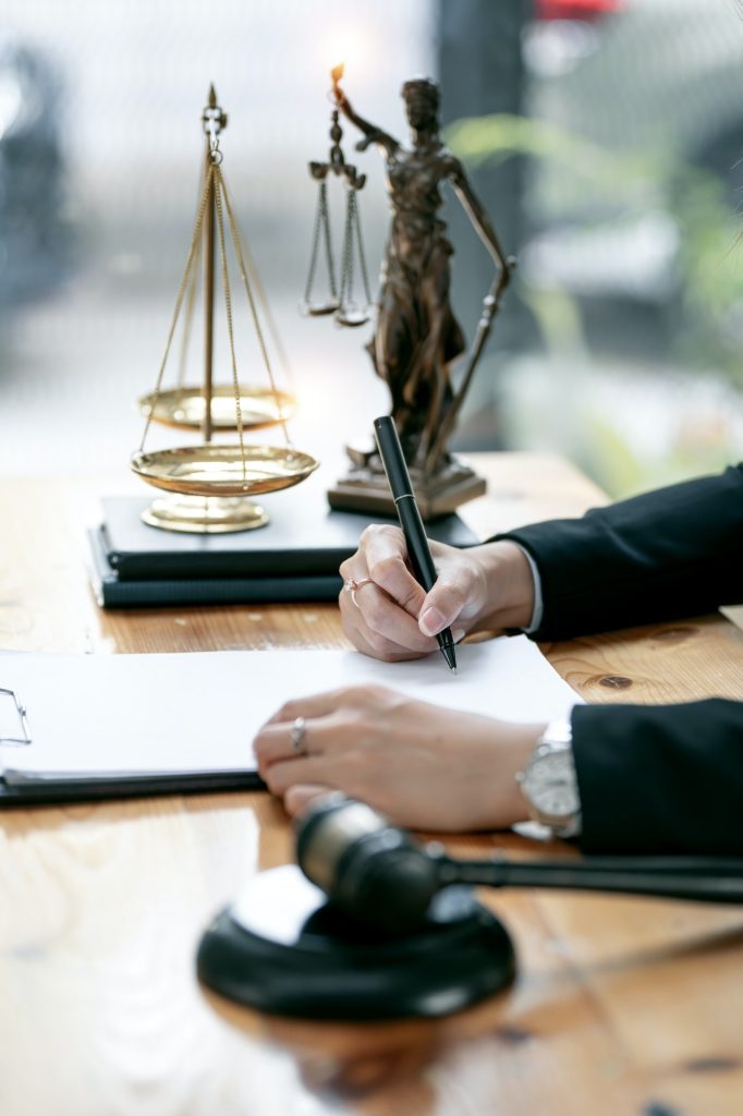 Justice lawyers, Businesswoman in suit or lawyer working on a documents.